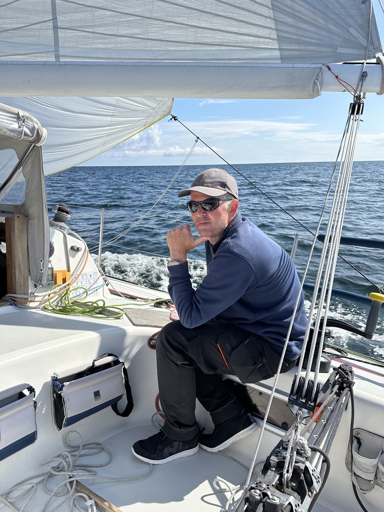 Nikolai Waltham aboard a sailing boat